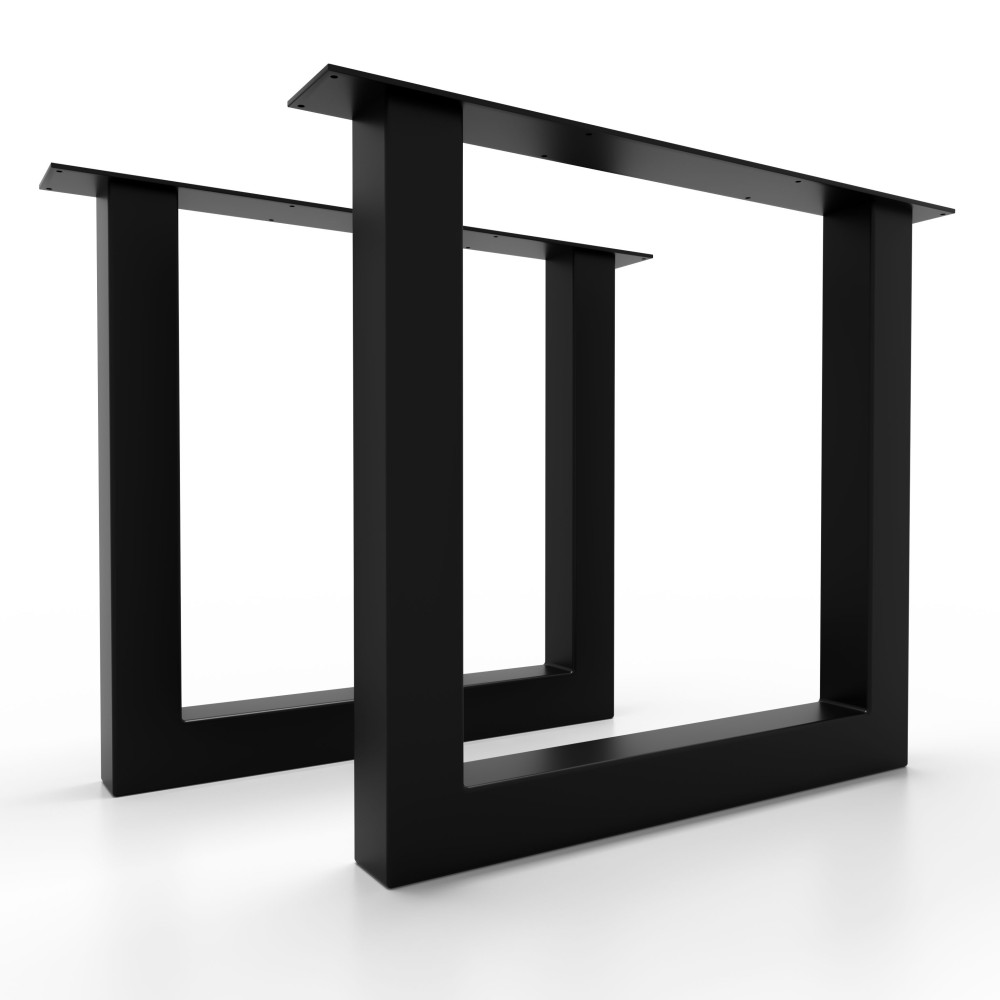 Tavolo con gambe robuste in ferro nero, perfetto per ambienti industrial chic.